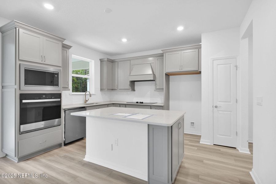 Furnished interior view inside a new home in Hyland Trail, Green Cove Springs (Image 11).