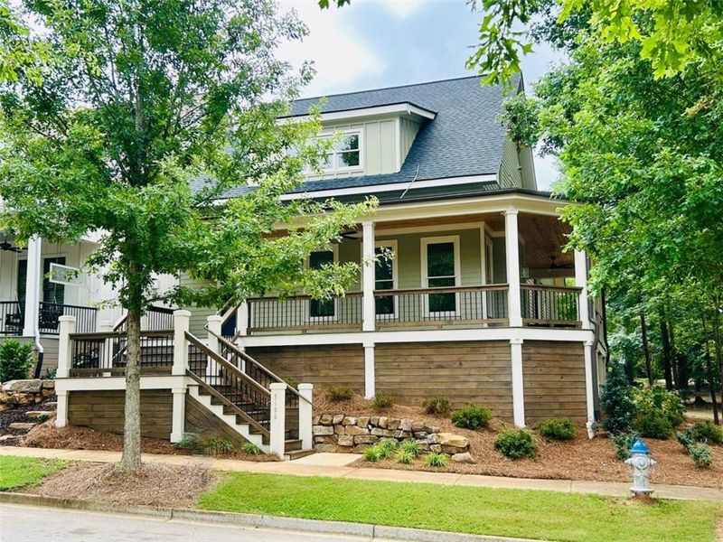 Front exterior of a new home in , Covington, GA, highlighting curb appeal (Image 25). Front exterior of a new home in , Covington, GA, highlighting curb appeal (Image 25).