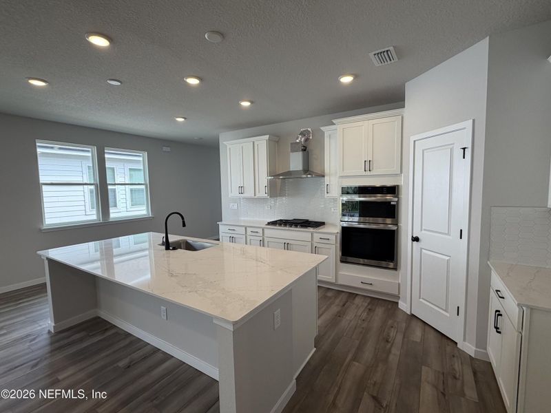 Furnished interior view inside a new home in Reserve East, Flagler Beach (Image 14).
