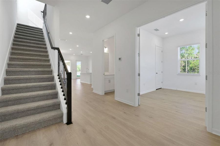 Spacious, unfurnished interior of a new home in Serenade at Ovation, Winter Garden (Image 36).