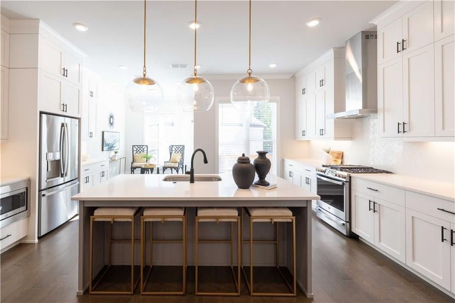 This gorgeous kitchen is loaded with cabinets! *Please note that pictures shown are of the Jacobsen II floorplan but they are not of the actual home listed.