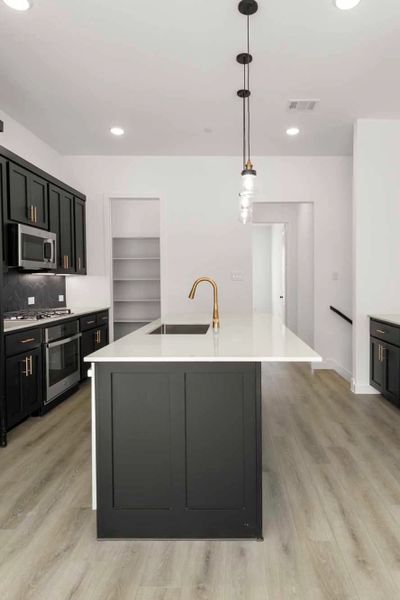 Kitchen featuring the Noir Collection