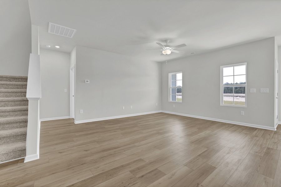 Spacious, unfurnished interior of a new home in River Tide Farms, Bolivia (Image 11).