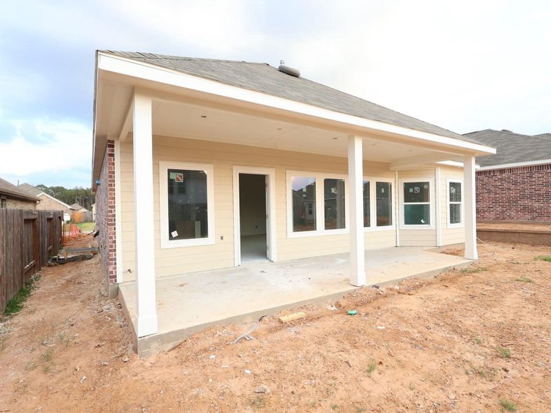 Exterior details and patio area of a home in Magnolia Ridge, Magnolia (Image 3). Exterior details and patio area of a home in Magnolia Ridge, Magnolia (Image 3).
