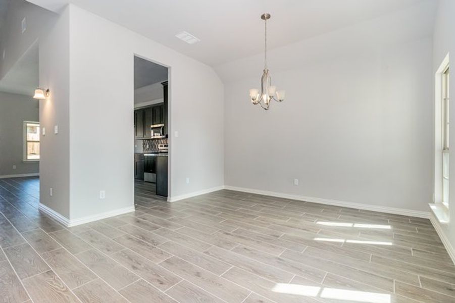 Spacious, unfurnished interior of a new home in Mustang Place II, Heartland (Image 13).