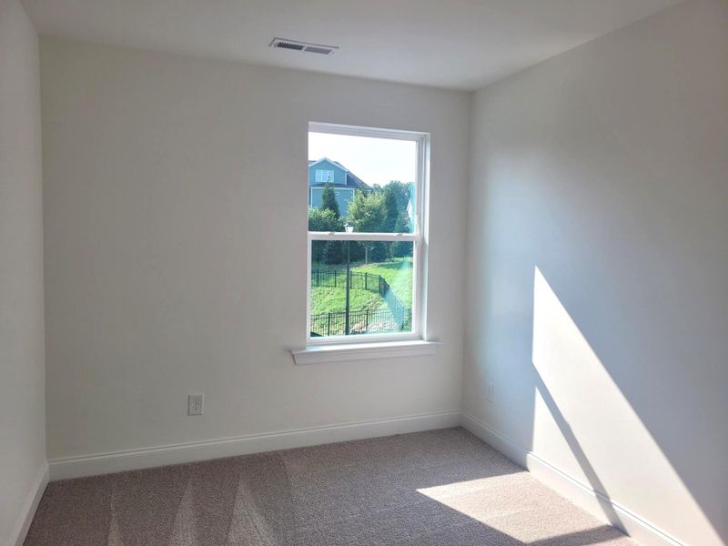 Spacious, unfurnished interior of a new home in Enclave at Traditions Townhomes, Wake Forest (Image 15).