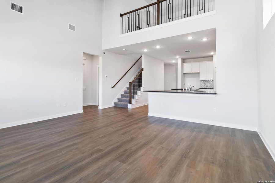 Spacious, unfurnished interior of a new home in Hunters Ranch, San Antonio (Image 4).