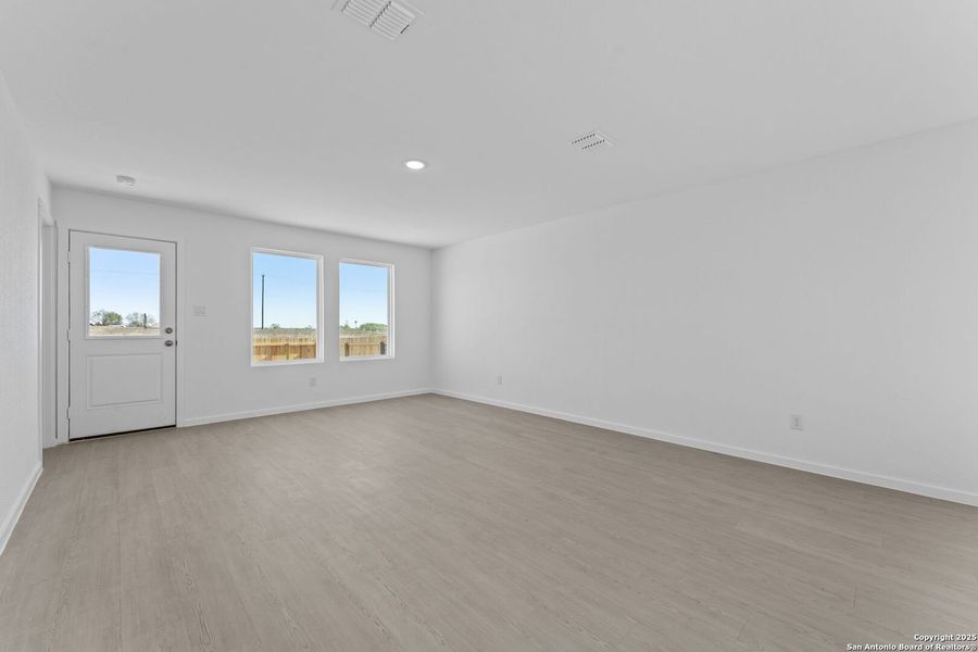 Spacious, unfurnished interior of a new home in Randolph Crossing: Cottage Collection, Converse (Image 13).