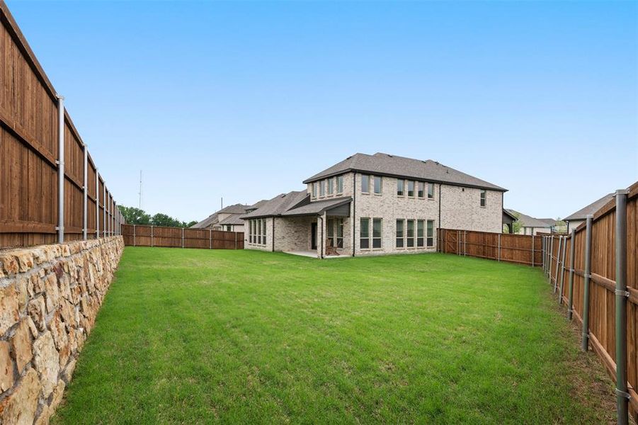 Front exterior of a new home in , Oak Point, TX, highlighting curb appeal (Image 24). Front exterior of a new home in , Oak Point, TX, highlighting curb appeal (Image 24).