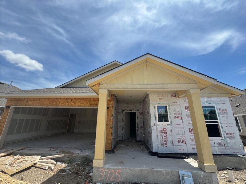 Front exterior of a new home in Village at Three Oaks, Seguin, TX, highlighting curb appeal (Image 12). Front exterior of a new home in Village at Three Oaks, Seguin, TX, highlighting curb appeal (Image 12).