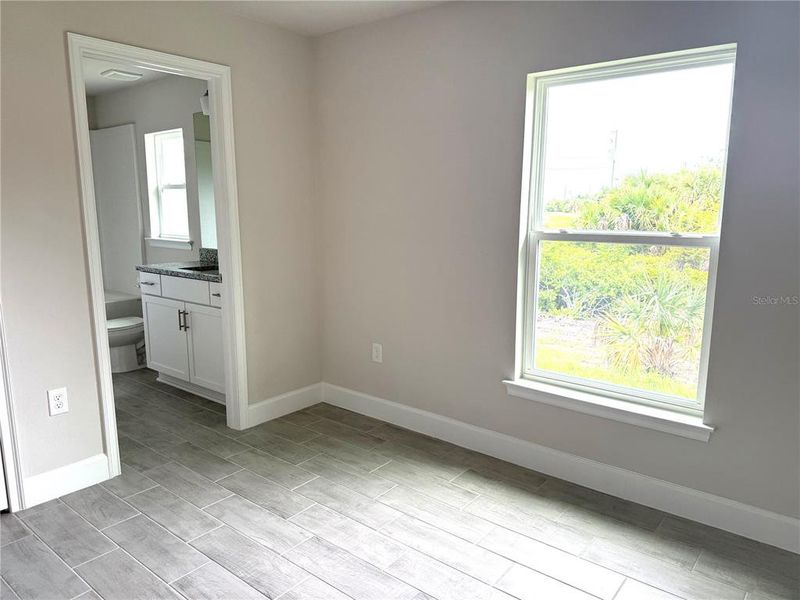 Spacious, unfurnished interior of a new home in South Gulf Cove, Port Charlotte (Image 24).