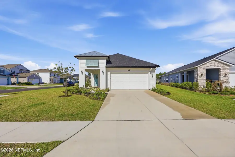 Front exterior of a new home in , St. Augustine, FL, highlighting curb appeal (Image 1). Front exterior of a new home in , St. Augustine, FL, highlighting curb appeal (Image 1).