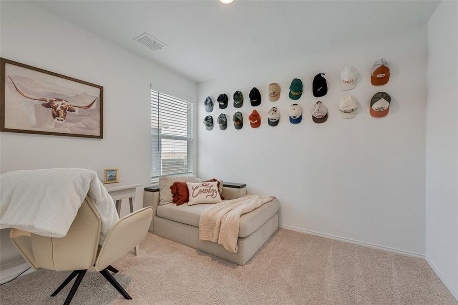 Bedroom with carpet floors and baseboards Bedroom with carpet floors and baseboards