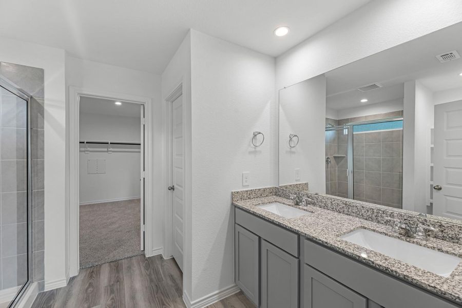 Furnished interior view inside a new home in Reserve at Mallard Lakes, Orange (Image 6).