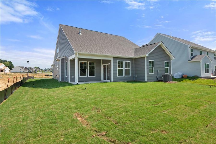 Exterior details and patio area of a home in , Loganville (Image 23).