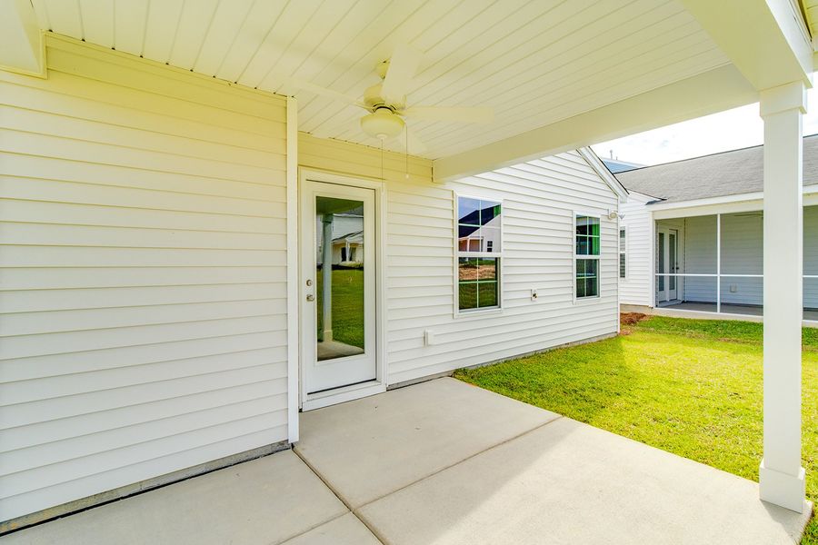 Front exterior of a new home in Winston Point, Gilbert, SC, highlighting curb appeal (Image 2).