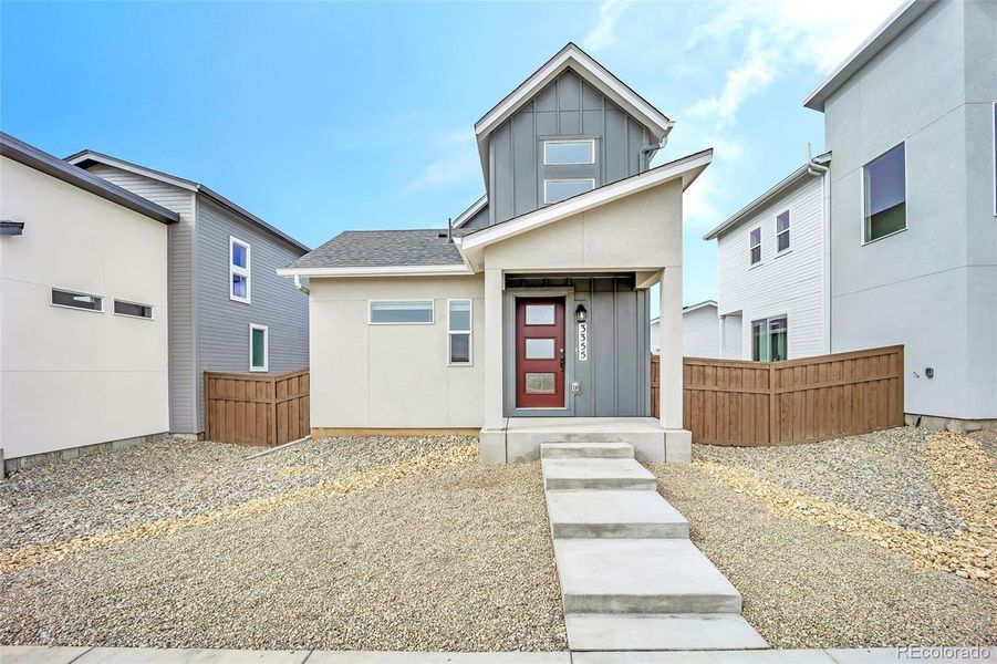 Front exterior of a new home in , Colorado Springs, CO, highlighting curb appeal (Image 22). Front exterior of a new home in , Colorado Springs, CO, highlighting curb appeal (Image 22).