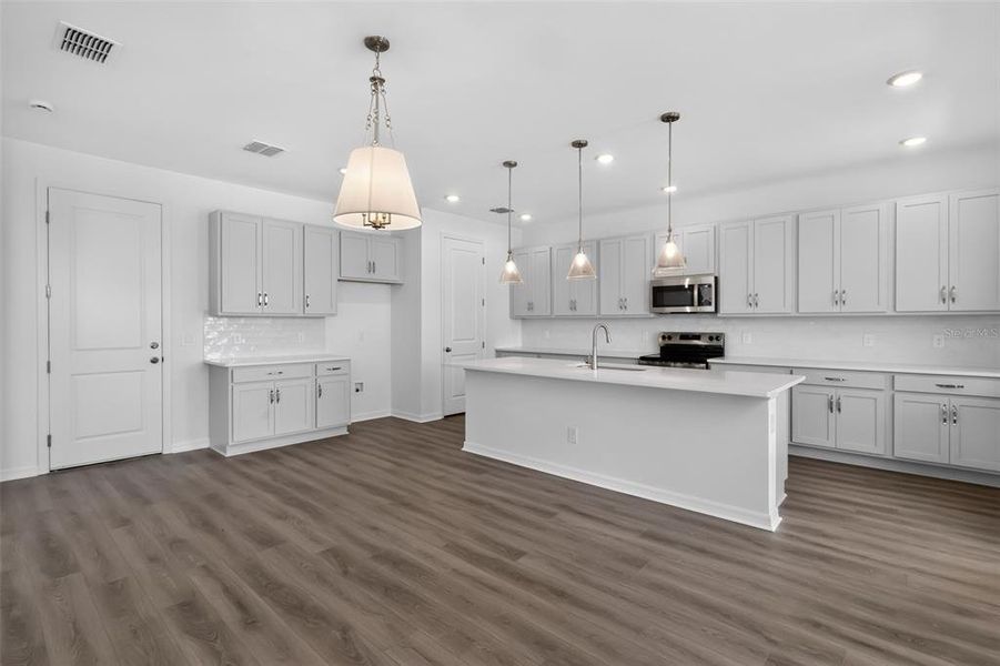 Furnished interior view inside a new home in , Kissimmee (Image 5).