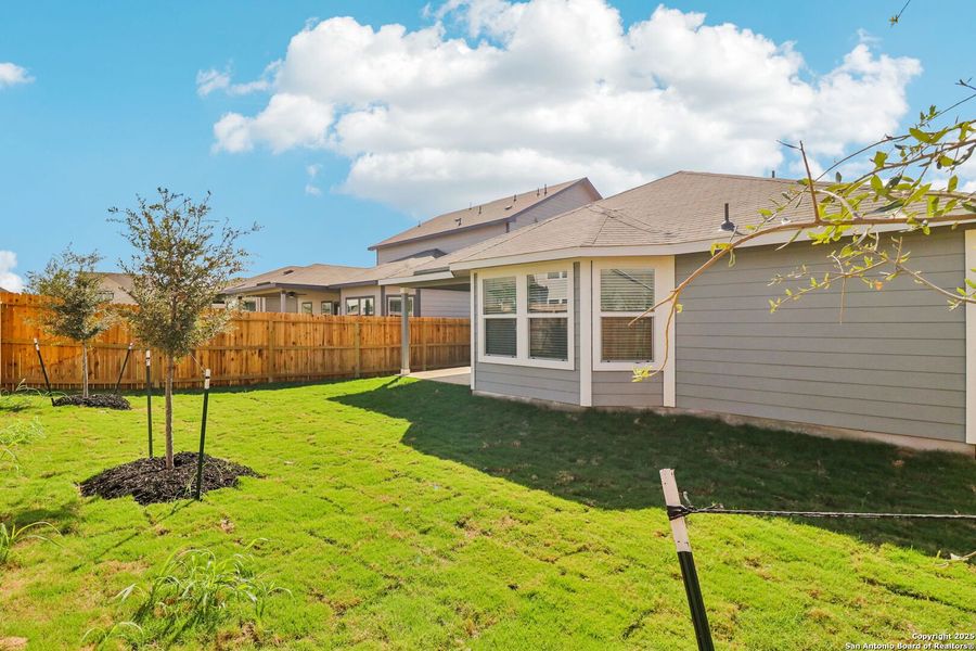 Exterior details and patio area of a home in Estancia Ranch - Premier Series, San Antonio (Image 2).