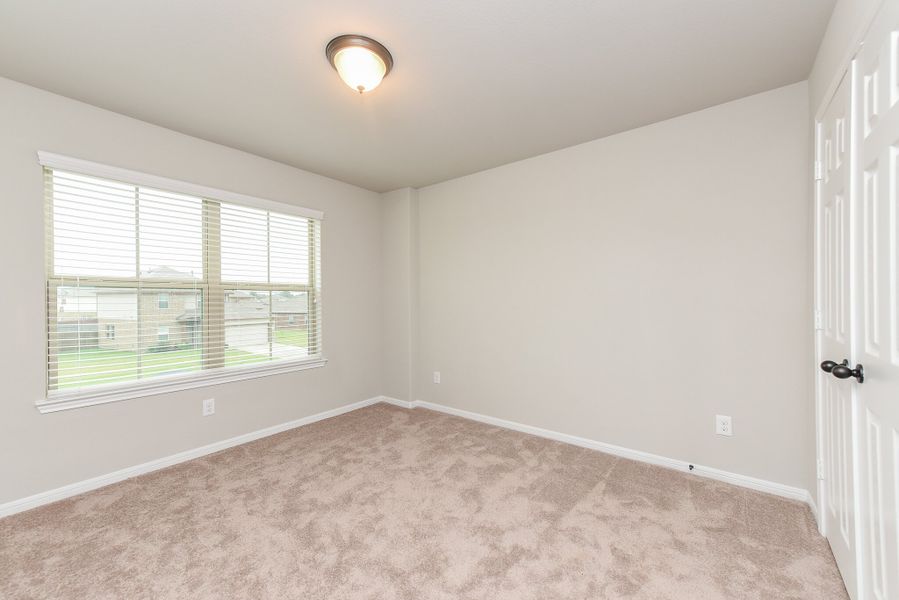 Representative unfurnished interior of a home built from the Floor Plan 2201 by Colina Homes in Grand Magnolia, Magnolia (Image 30).