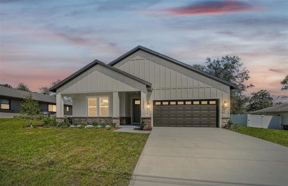 Front exterior of a new home in , Spring Hill, FL, highlighting curb appeal (Image 25). Front exterior of a new home in , Spring Hill, FL, highlighting curb appeal (Image 25).