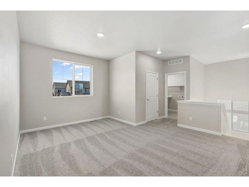 Spacious, unfurnished interior of a new home in Highlands Preserve, Mead (Image 16).