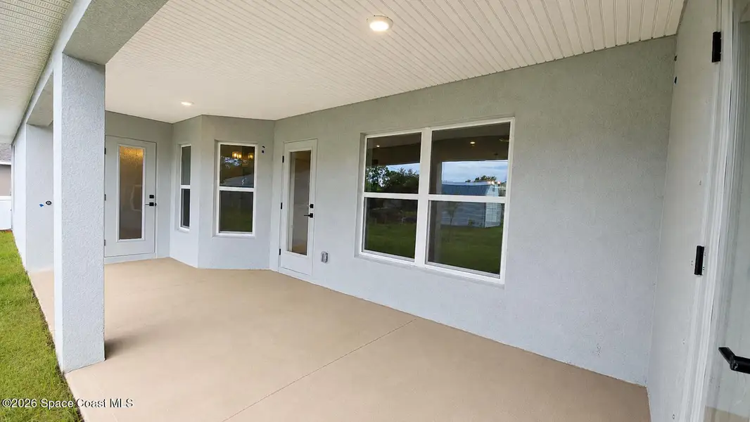 Exterior details and patio area of a home in Palm Bay, Palm Bay (Image 2). Exterior details and patio area of a home in Palm Bay, Palm Bay (Image 2).