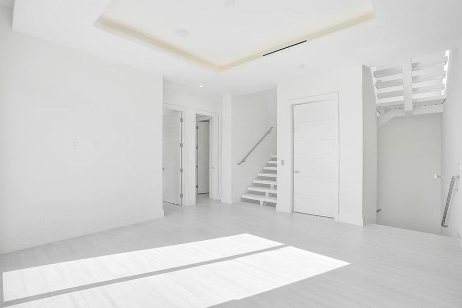 Second-Floor Loft — Versatile loft ideal as a fifth bedroom, media room, or entertaining space with the option for a wet or dry bar.