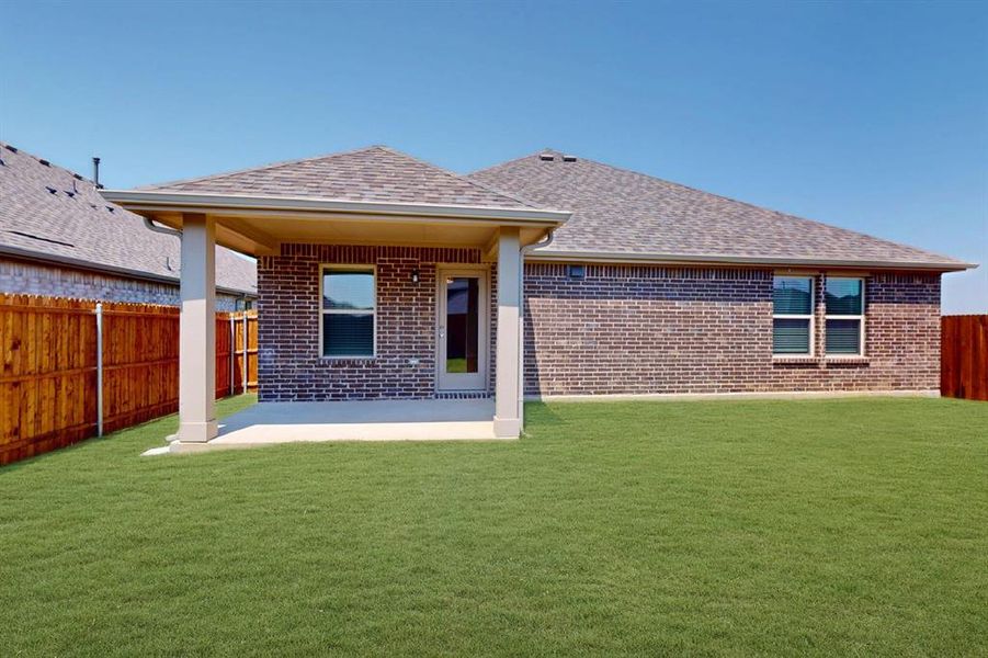 Front exterior of a new home in Sagebrook, Argyle, TX, highlighting curb appeal (Image 2). Front exterior of a new home in Sagebrook, Argyle, TX, highlighting curb appeal (Image 2).