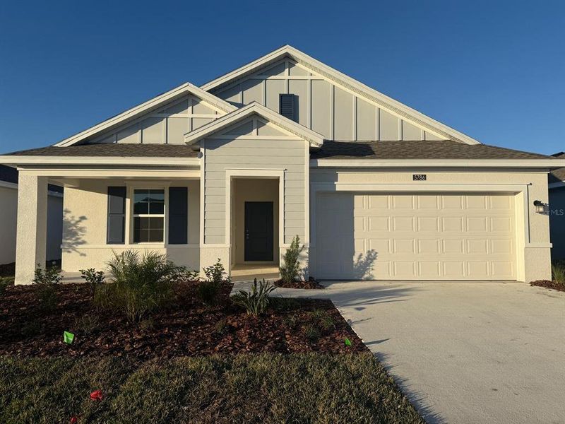 Front exterior of a new home in , Kissimmee, FL, highlighting curb appeal (Image 28).