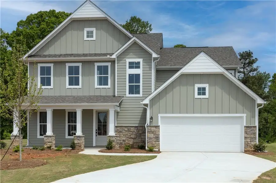 Front exterior of a new home in Austin Springs, Bethlehem, GA, highlighting curb appeal (Image 2). Front exterior of a new home in Austin Springs, Bethlehem, GA, highlighting curb appeal (Image 2).