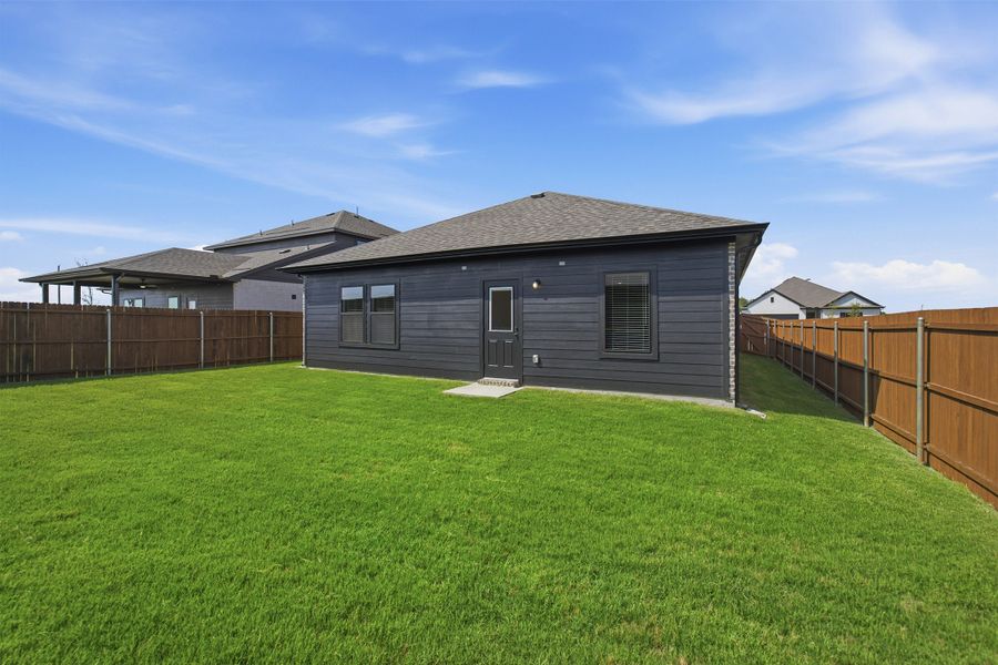 Exterior details and patio area of a home in Heartland, Crandall (Image 21).
