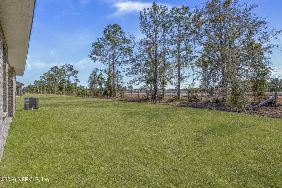 Exterior details and patio area of a home in , Green Cove Springs (Image 3).