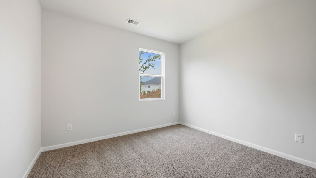 Spacious, unfurnished interior of a new home in The Preserve at Agricultural Village, Perry (Image 23).