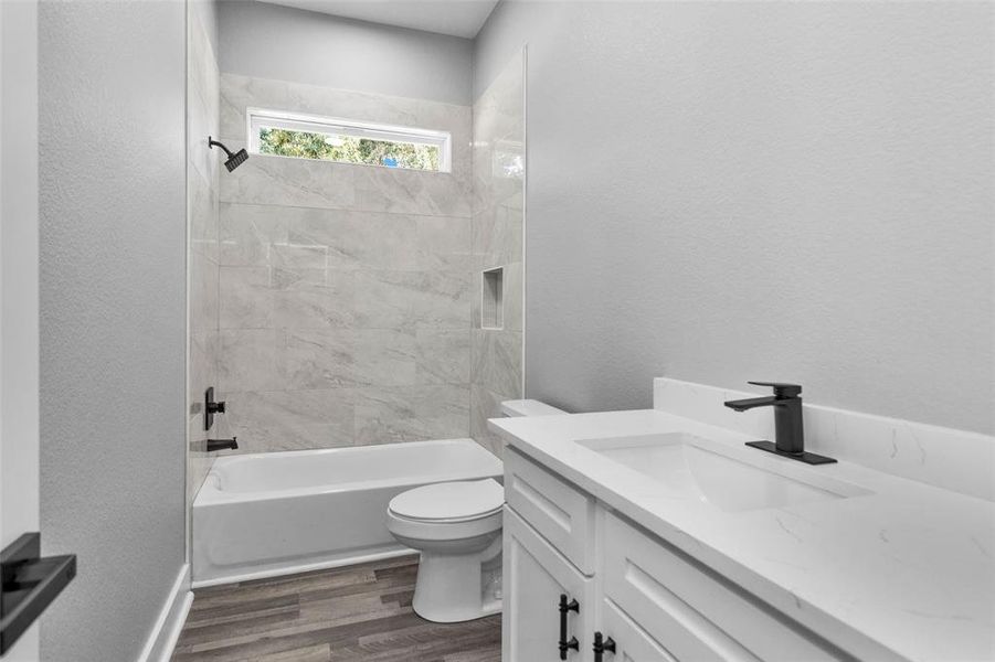 Full bath attached to Bedroom #2 and hall. Mirror will be added prior to closing. Look at these gorgeous finishes!