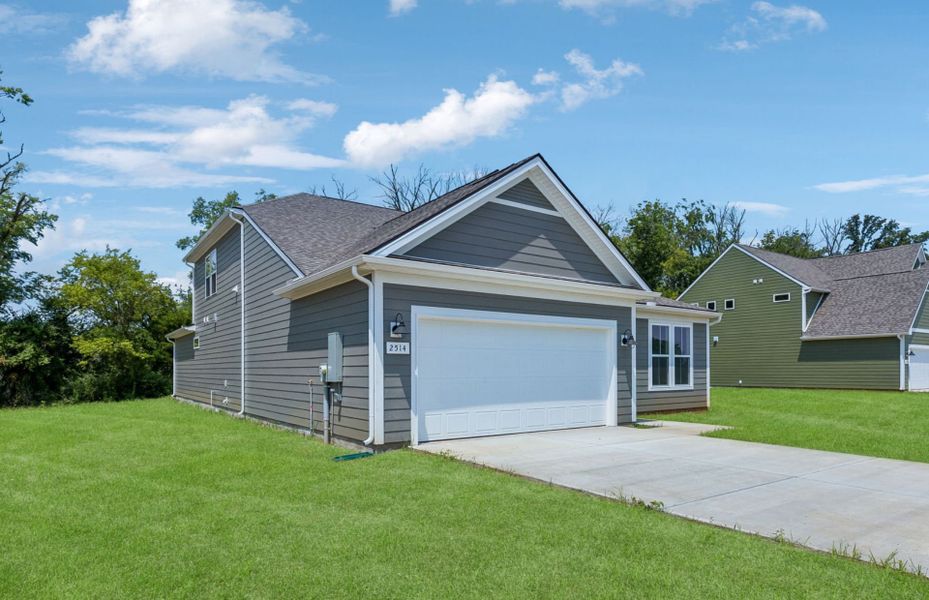 Front exterior of a new home in Glenview Farms, Murfreesboro, TN, highlighting curb appeal (Image 24). Front exterior of a new home in Glenview Farms, Murfreesboro, TN, highlighting curb appeal (Image 24).