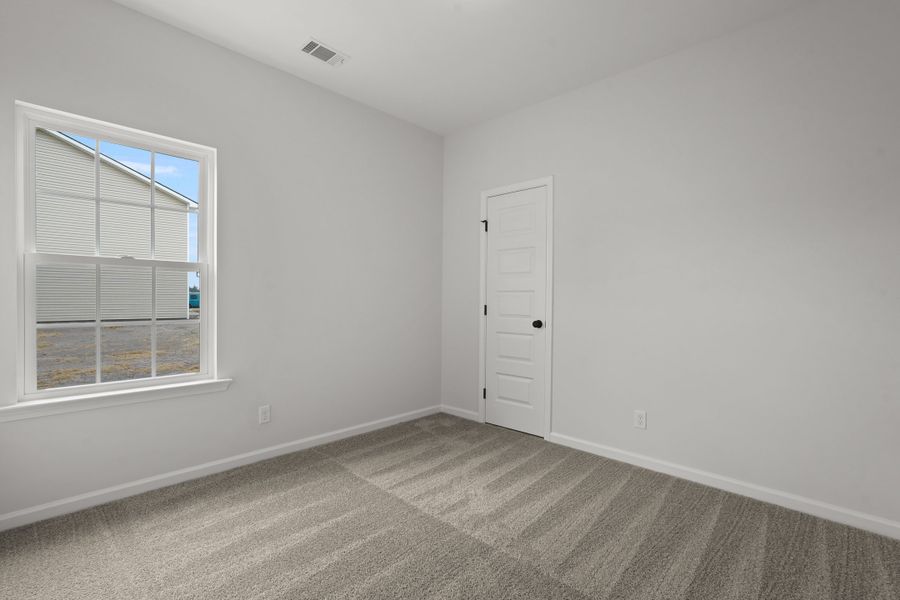 Representative unfurnished interior of a home built from the The Stafford by RTS Homes in Doctor's Creek, Ludowici (Image 36).