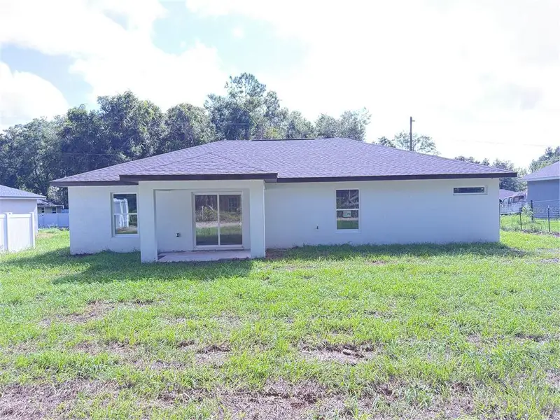 Exterior details and patio area of a home in , Ocala (Image 3).