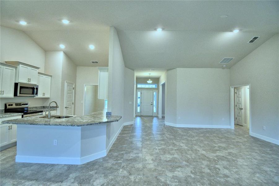 Furnished interior view inside a new home in Cadence Crossing, Auburndale (Image 4). Furnished interior view inside a new home in Cadence Crossing, Auburndale (Image 4).