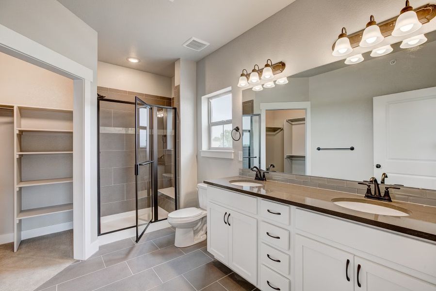 Furnished interior view inside a new home in The Lakes at Centerra - North Shore Flats, Loveland (Image 9).