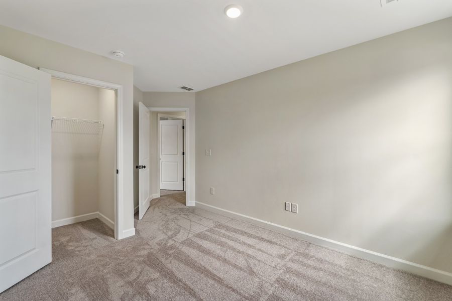 Spacious, unfurnished interior of a new home in Cottages at Lake Emory, Inman (Image 32). Spacious, unfurnished interior of a new home in Cottages at Lake Emory, Inman (Image 32).
