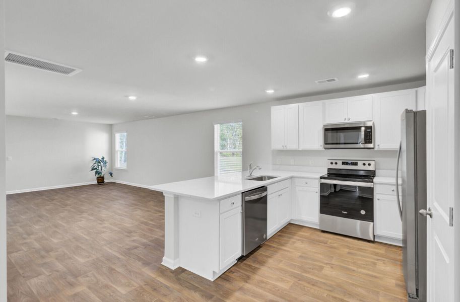 Furnished interior view inside a new home in Center Pointe, Santee (Image 8). Furnished interior view inside a new home in Center Pointe, Santee (Image 8).