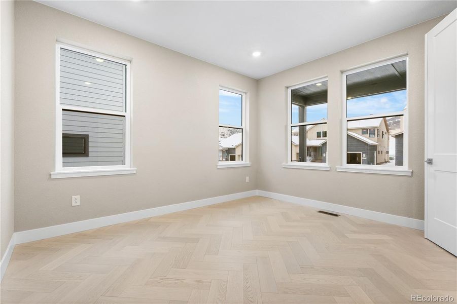 Spacious, unfurnished interior of a new home in Autograph at Lyric, Lone Tree (Image 44).