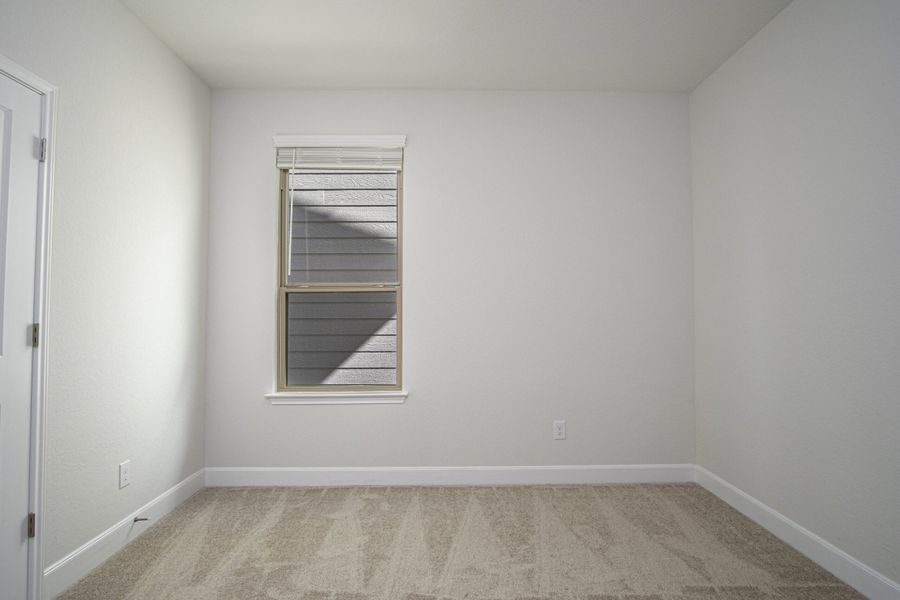 Representative unfurnished interior of a home built from the The Palmer by Rosehaven Homes in Magnolia Village, San Antonio (Image 22).