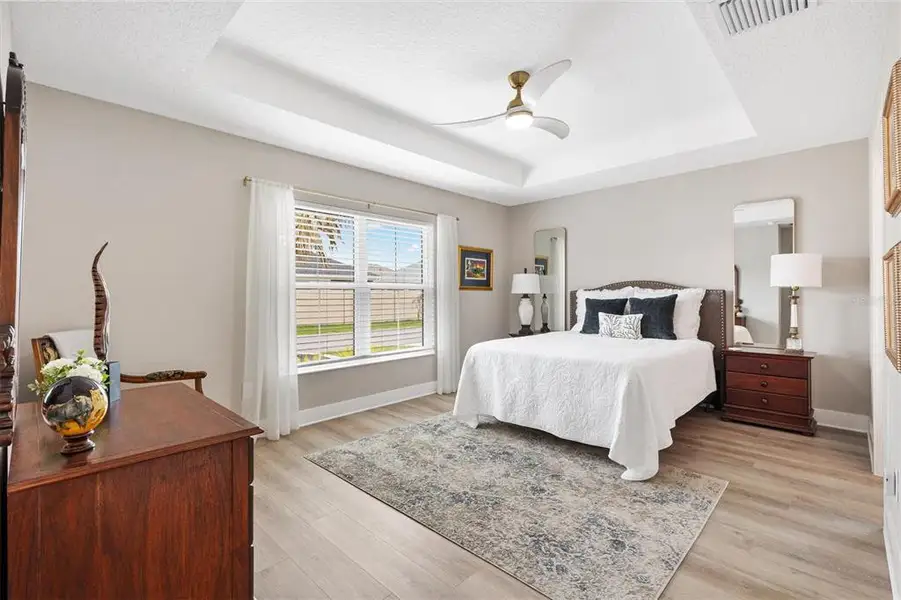 Furnished interior view inside a new home in , The Villages (Image 17).