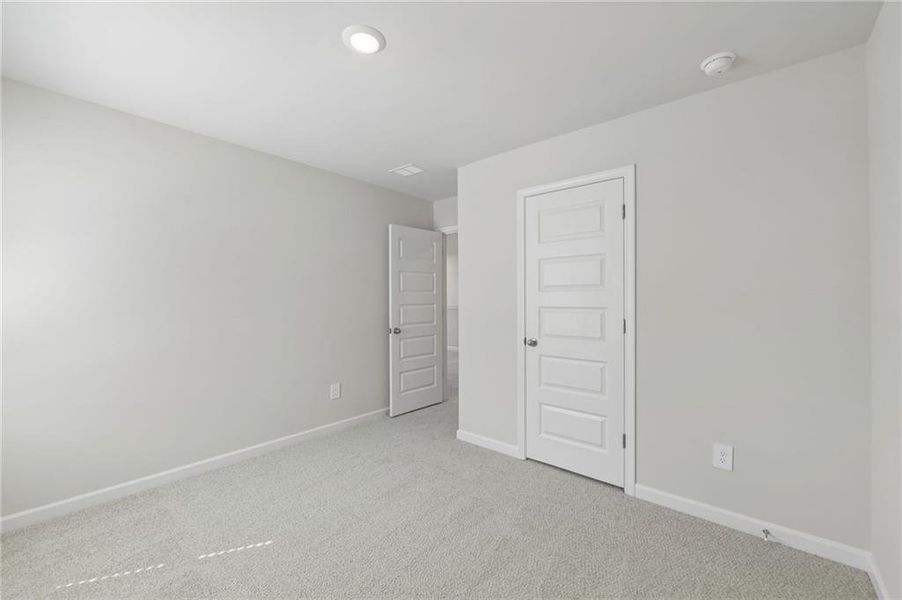 Spacious, unfurnished interior of a new home in Hemingway - Reserve Series, Cumming (Image 38).