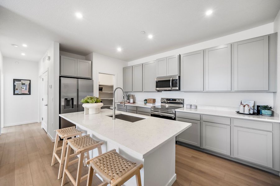 Furnished interior view inside a new home in Lyric at RidgeGate Condos, Lone Tree (Image 9).