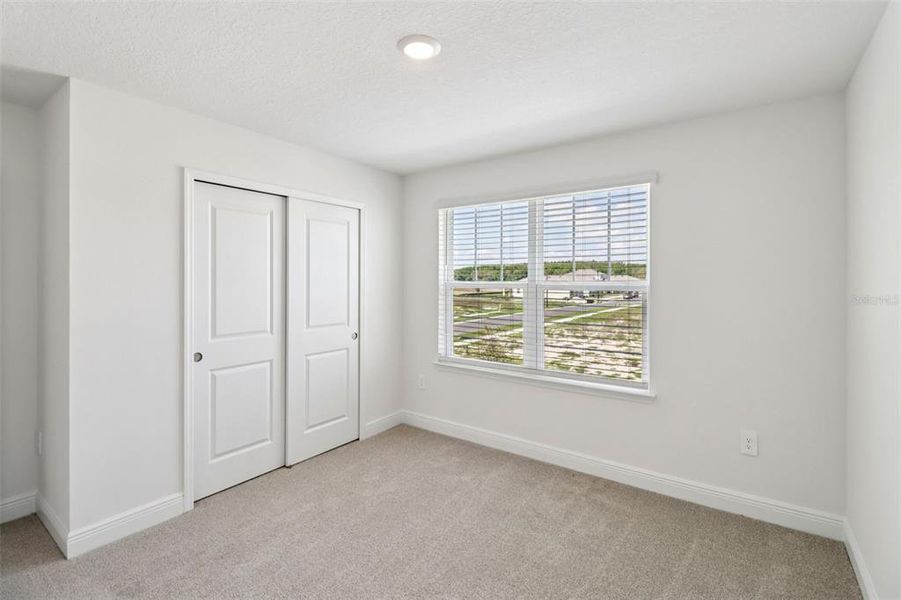 Spacious, unfurnished interior of a new home in The Reserve at Hammock Oaks - Classic Series, Lady Lake (Image 15).