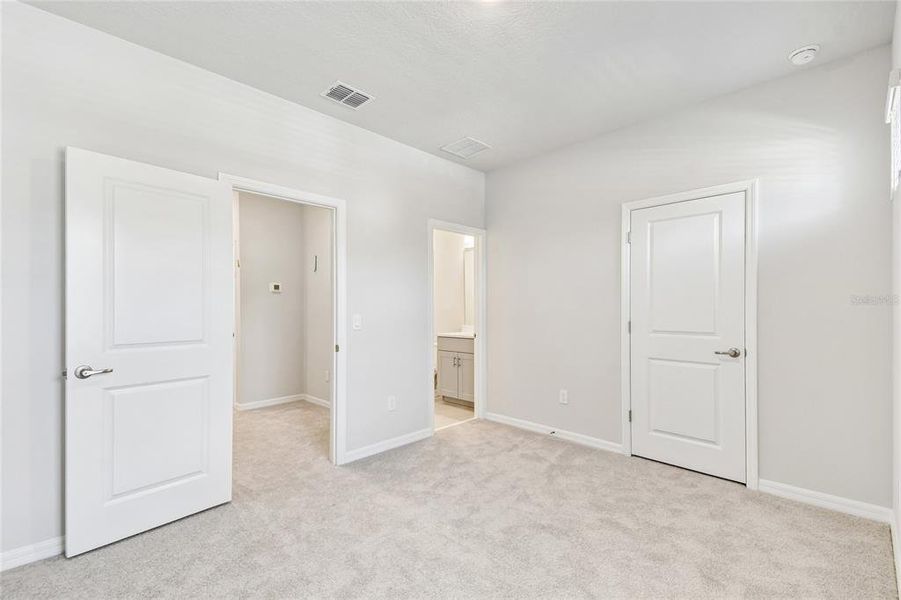 Spacious, unfurnished interior of a new home in Preserve at The Cays – The Driftwood Series, Daytona Beach (Image 26). Spacious, unfurnished interior of a new home in Preserve at The Cays – The Driftwood Series, Daytona Beach (Image 26).