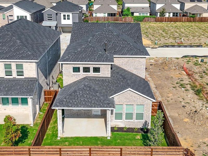 Front exterior of a new home in Royal Court, Little Elm, TX, highlighting curb appeal (Image 20).
